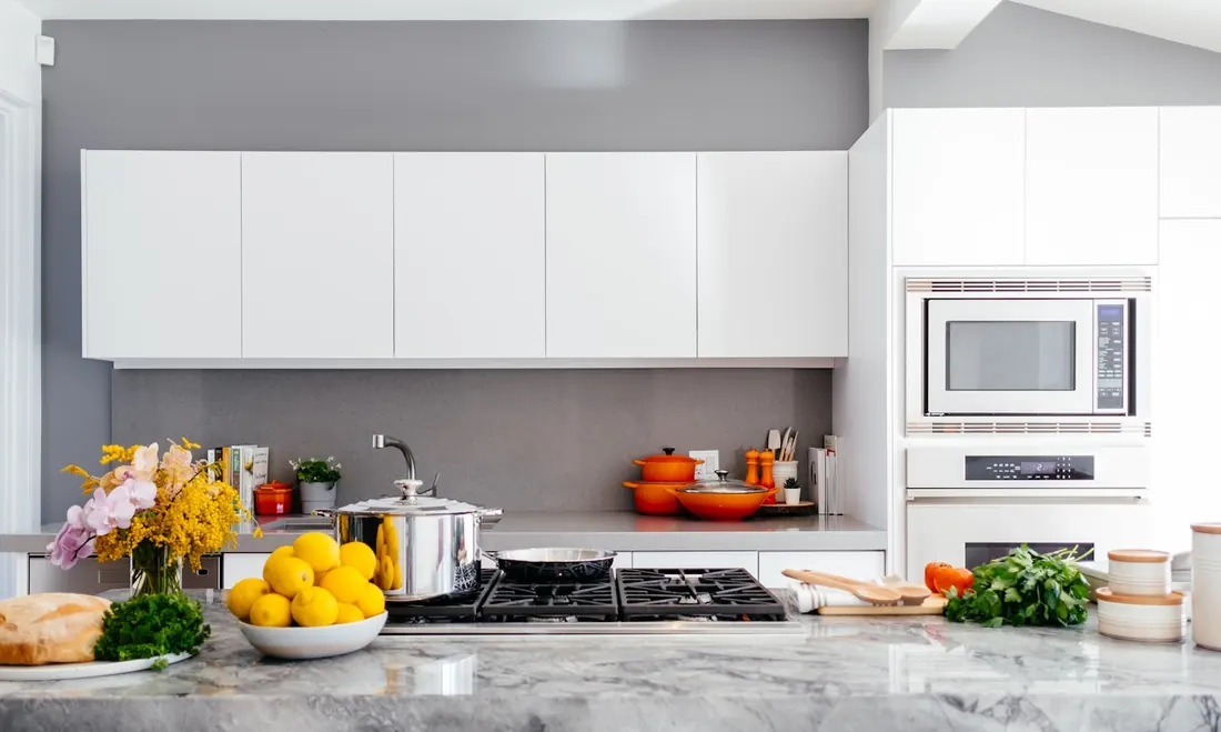 Warm kitchen with cookware and natural light